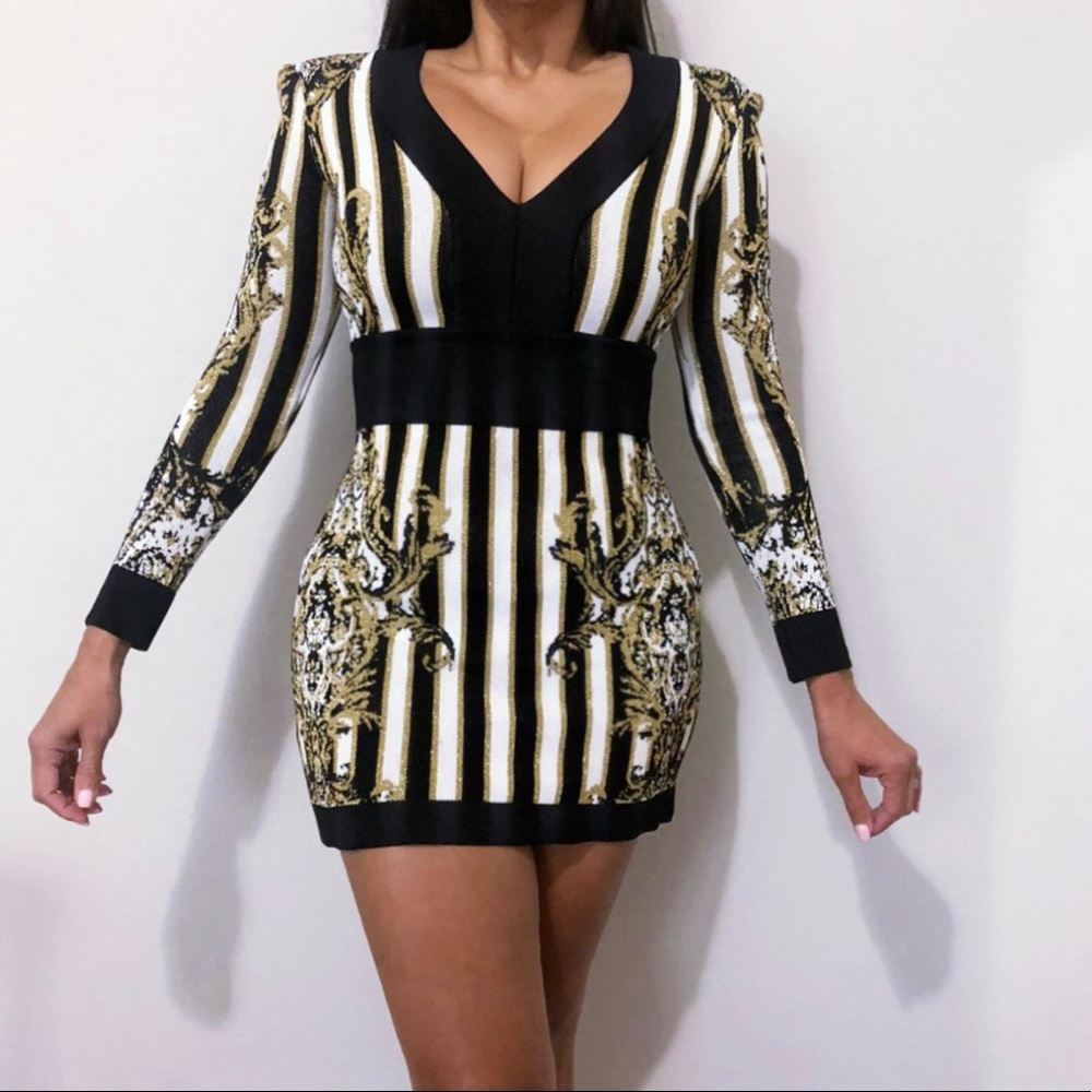 Balmain long sleeve white, black, and gold dress size 6.